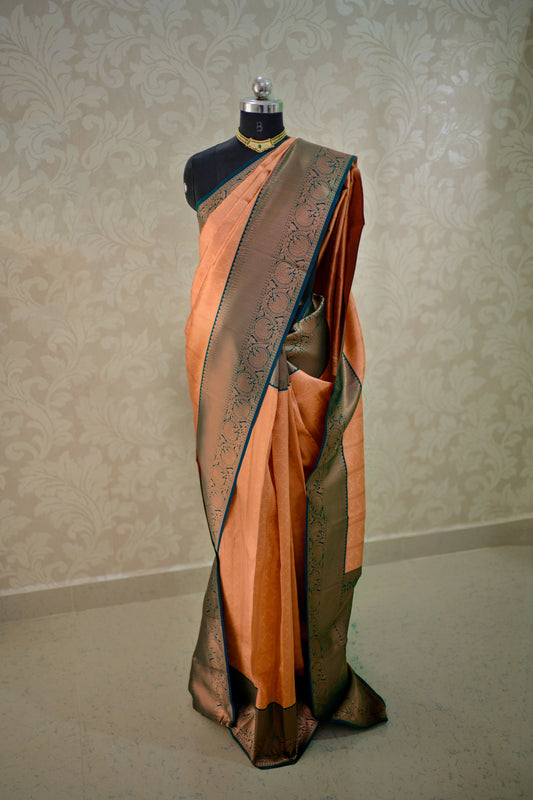 Warm Peach and Deep Green Border Zari Chiffon Silk Saree with Unstitched Blouse